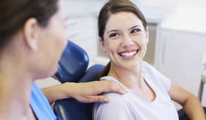 Woman smiling in dental chair