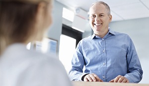 Smiling man visiting the dental office