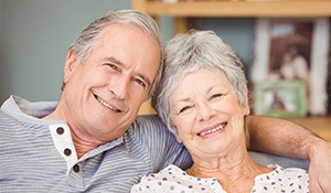 Smiling senior man and woman