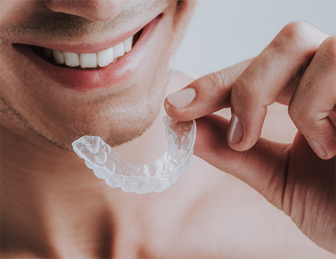 Man about to put in a mouthguard