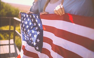 People holding American flag