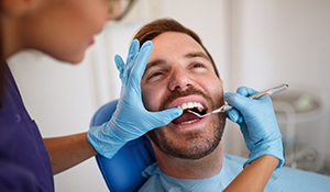 Man receiving dental exam