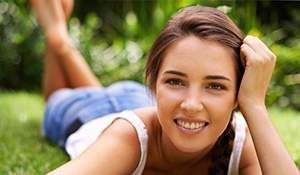 Woman smiling outdoors