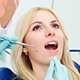 Woman receiving dental treatment