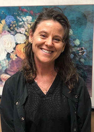 Headshot of dental hygienist Debi
