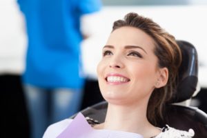 Smiling woman in the dental chair.