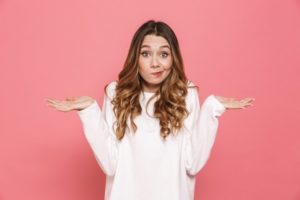 woman deciding between veneers and same-day crowns