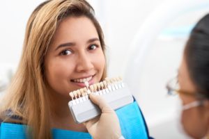 woman getting veneers and learning about the types of veneers