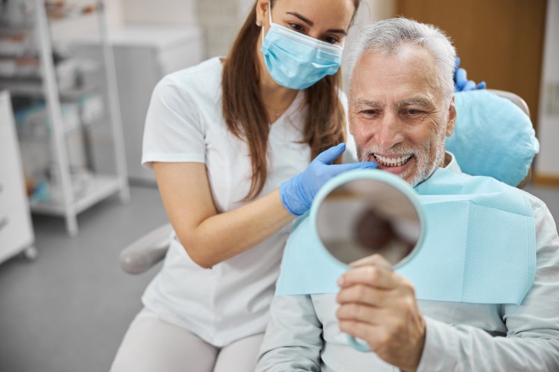 A man happy with his dental implants
