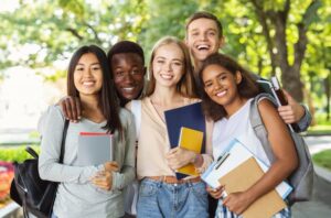 group of college students smiling together