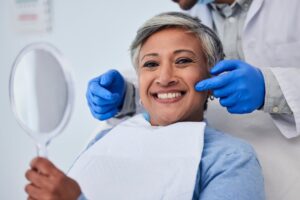 Woman smiling in the dentist’s chair